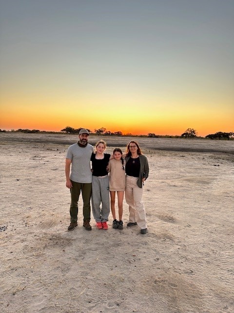 An Safari Awecrafters family together at sunset in Africa
